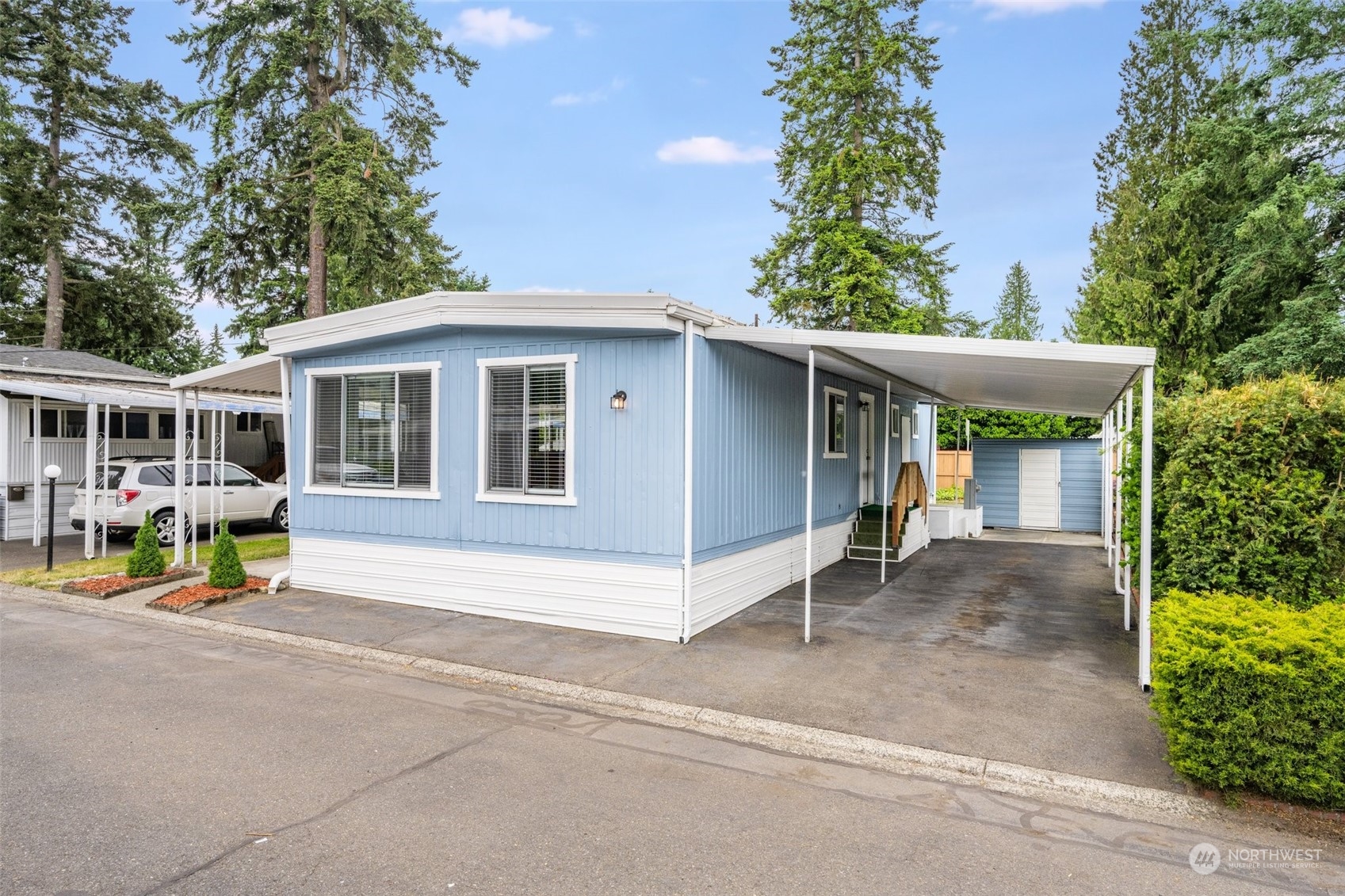 2302 R Street Southeast, Unit 12 Auburn, WA 98002 - Photo 30 of 34 a view of back yard of the house