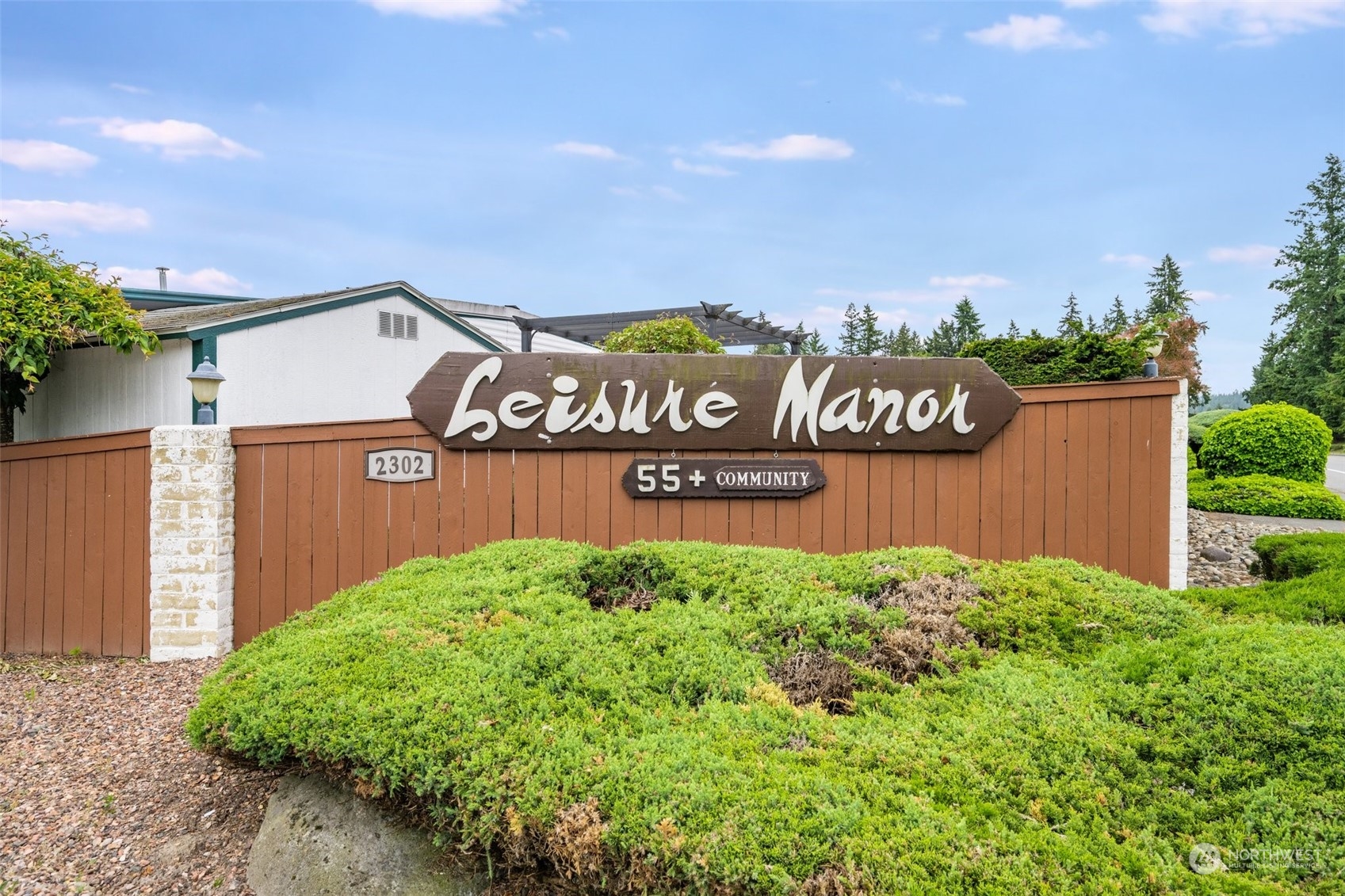 2302 R Street Southeast, Unit 12 Auburn, WA 98002 - Photo 34 of 34 a view of outdoor space with garden and trees