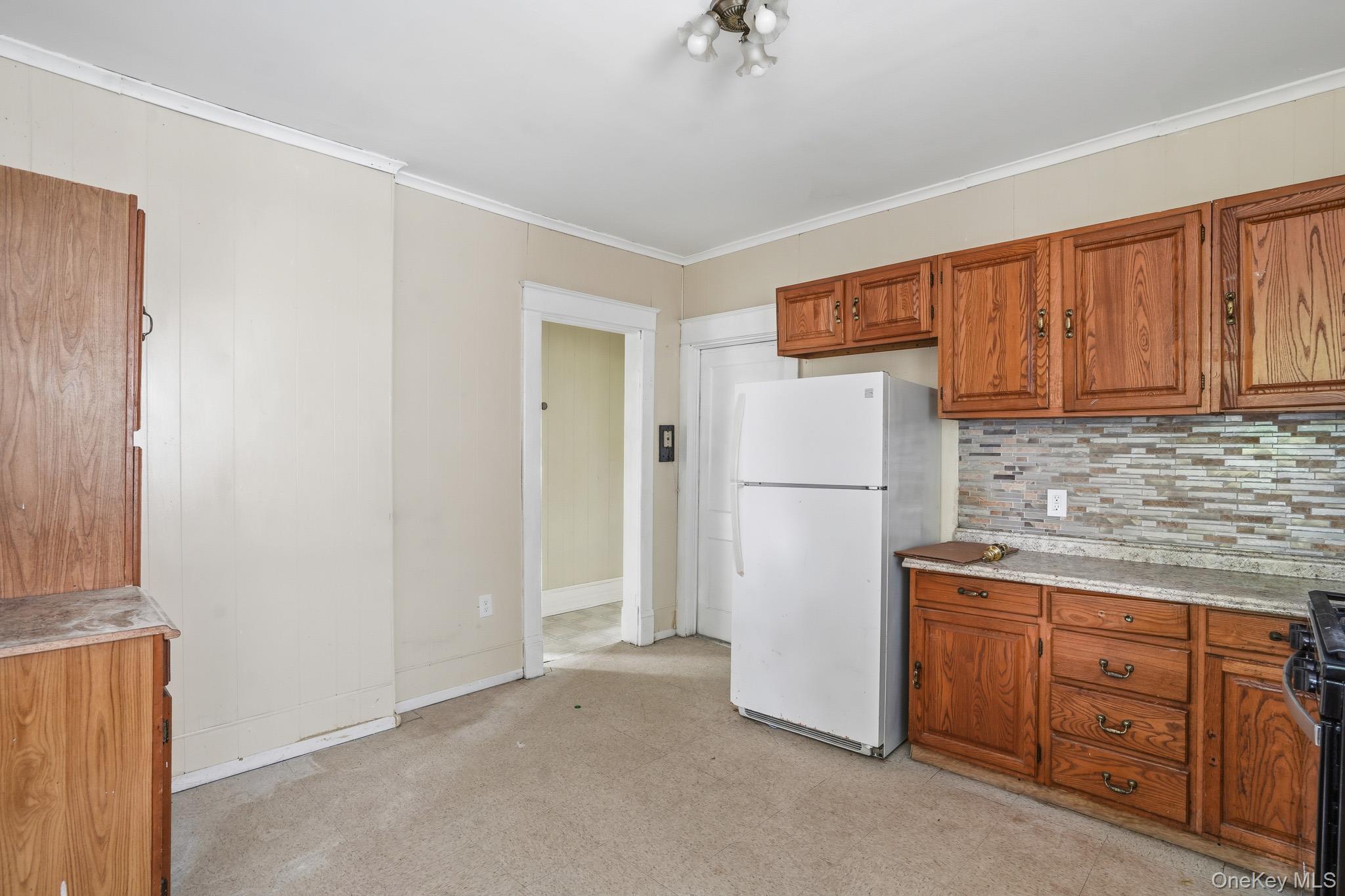 65 North Clinton Street Poughkeepsie, NY 12601 - Photo 14 of 43 a view of a kitchen with cabinets