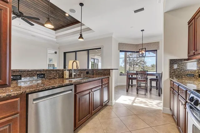 a spacious bathroom with a tub sink and mirror