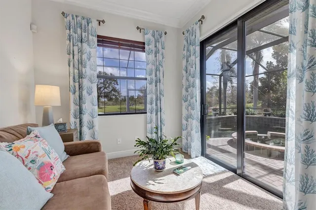 a bedroom with two beds and a window