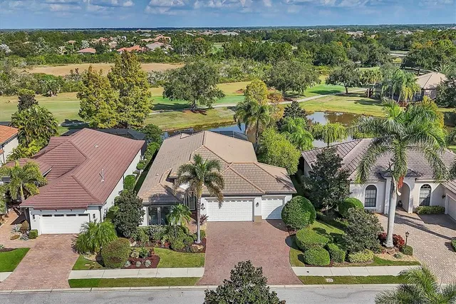 a view of a lake with a yard