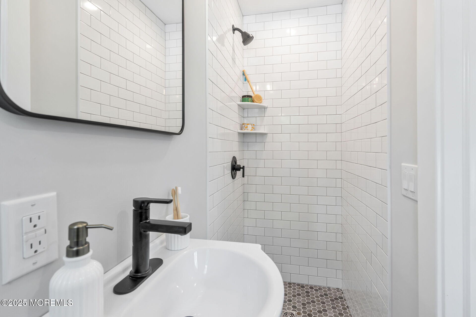 1276 West Front Street Lincroft, NJ 07738 - Photo 23 of 66 a bathroom with a sink a toilet and shower