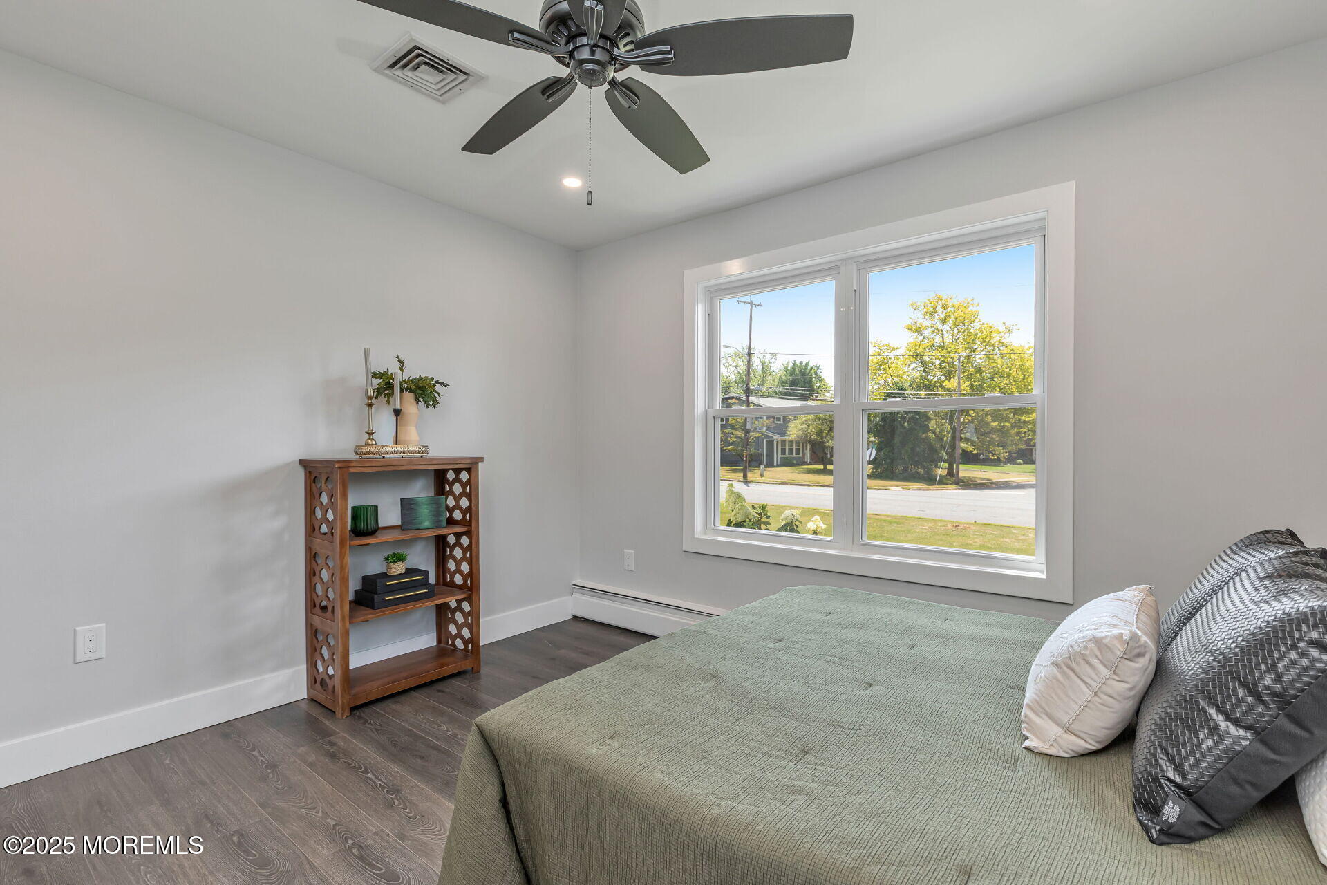 1276 West Front Street Lincroft, NJ 07738 - Photo 24 of 66 a spacious bedroom with a bed and a window