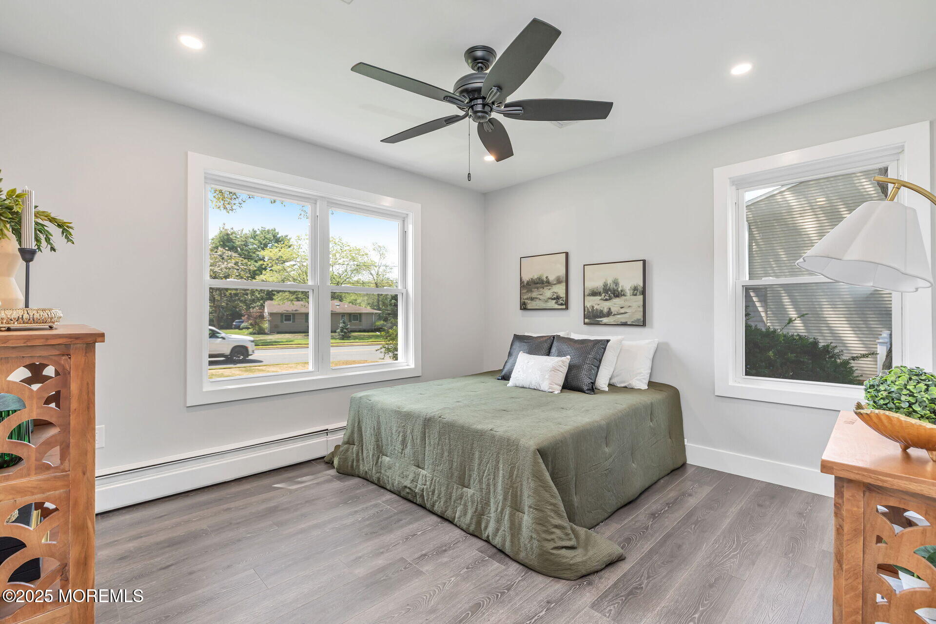 1276 West Front Street Lincroft, NJ 07738 - Photo 25 of 66 a bedroom with a bed and a large window with the outer view