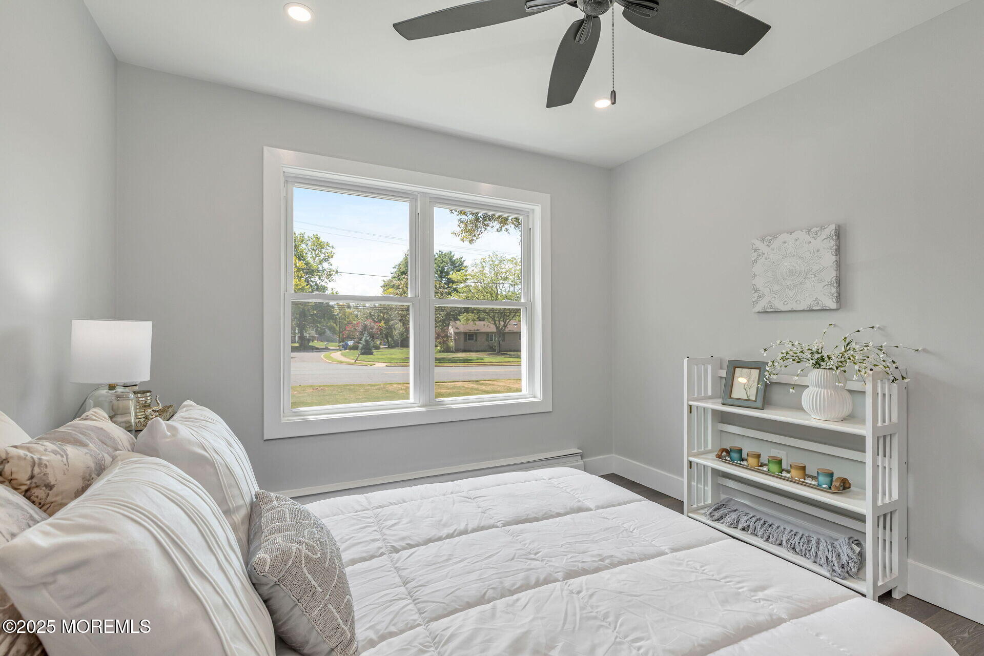 1276 West Front Street Lincroft, NJ 07738 - Photo 27 of 66 a bedroom with a bed and a window