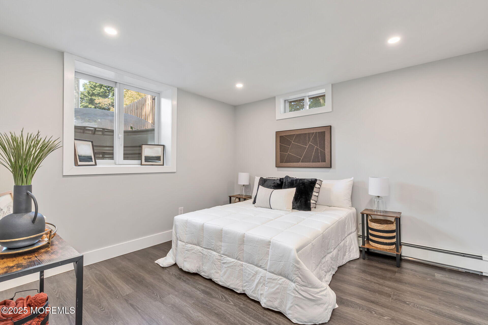 1276 West Front Street Lincroft, NJ 07738 - Photo 35 of 66 a bedroom with a large bed and a window