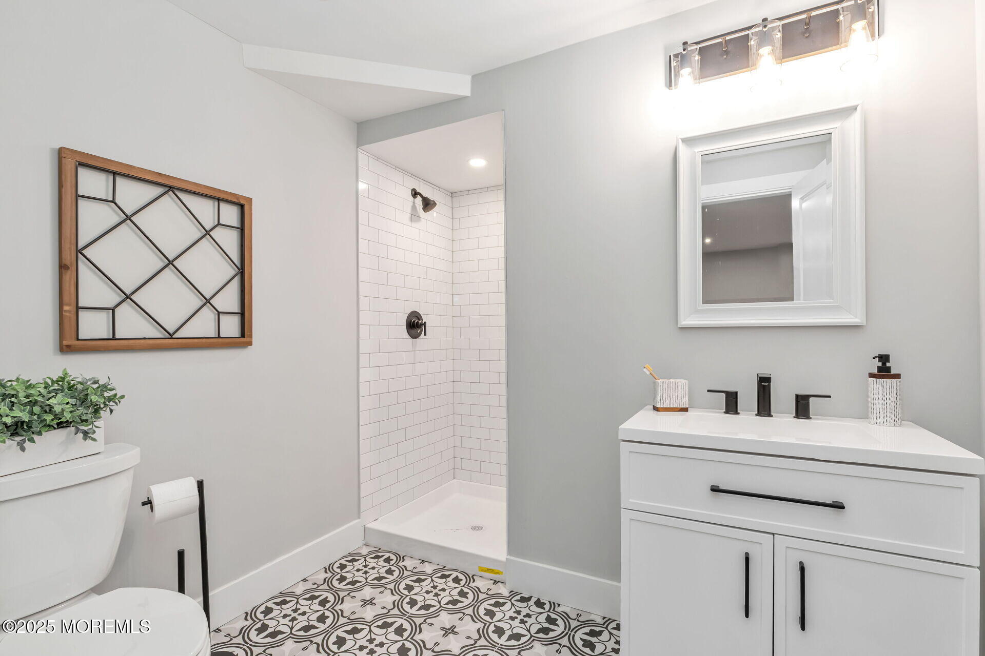 1276 West Front Street Lincroft, NJ 07738 - Photo 36 of 66 a bathroom with a sink toilet and shower