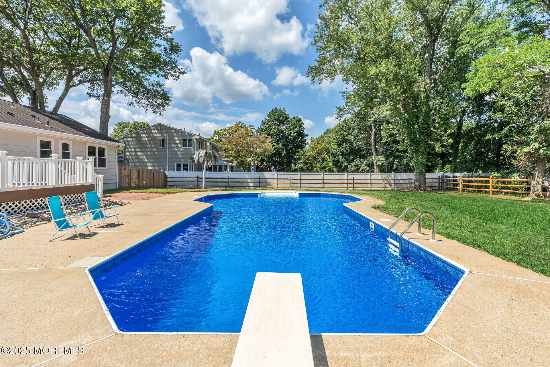 1276 West Front Street Lincroft, NJ 07738 - Photo 43 of 66 a view of a swimming pool with an outdoor seating