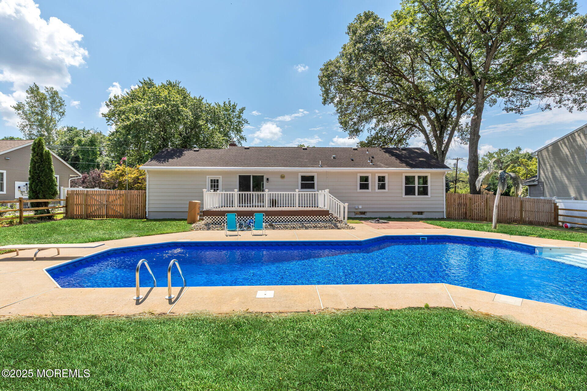 1276 West Front Street Lincroft, NJ 07738 - Photo 45 of 66 a view of house with yard outdoor seating and swimming pool