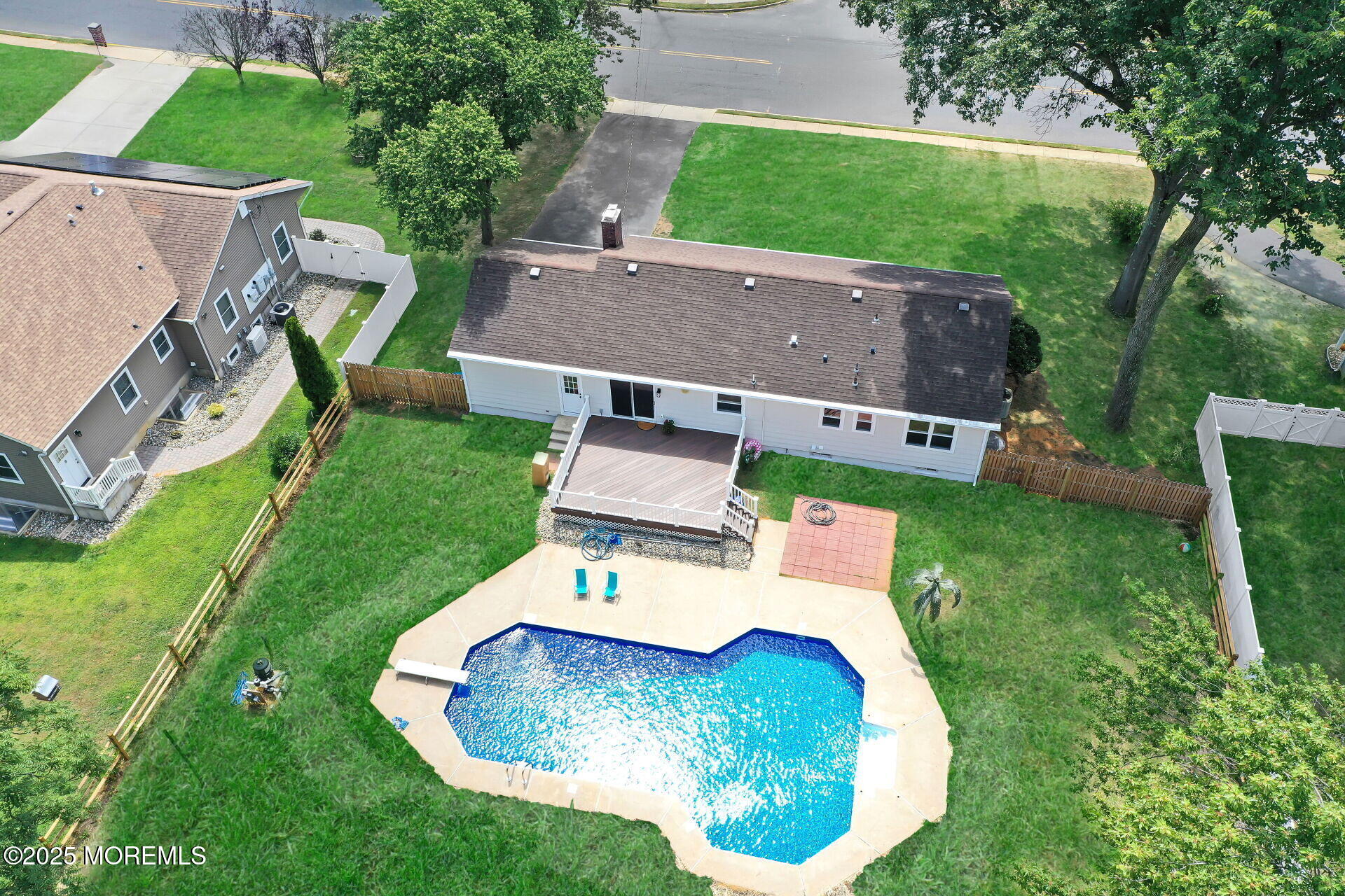1276 West Front Street Lincroft, NJ 07738 - Photo 57 of 66 an aerial view of a house with garden space and street view