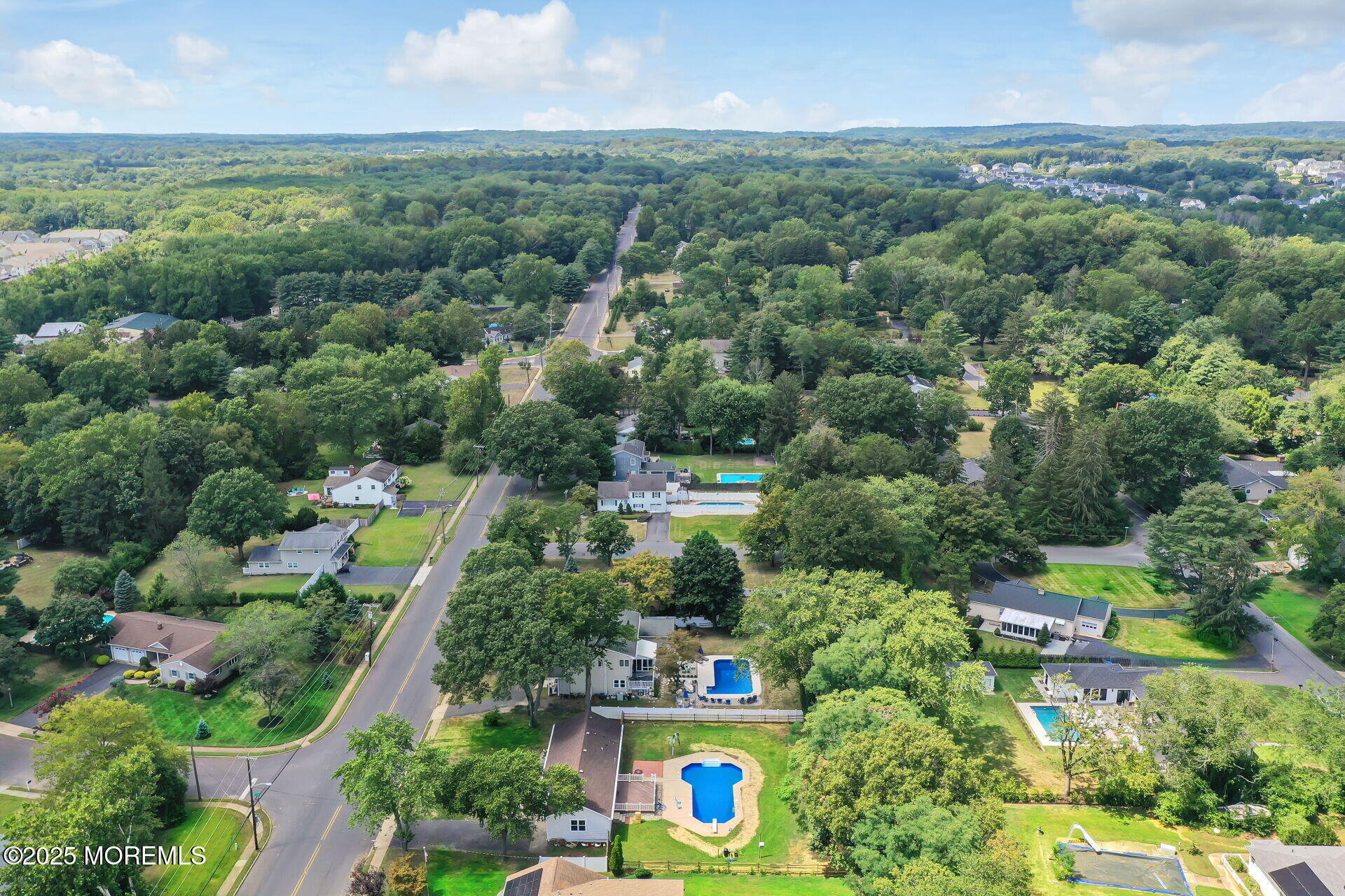 1276 West Front Street Lincroft, NJ 07738 - Photo 58 of 66 an aerial view of multiple house