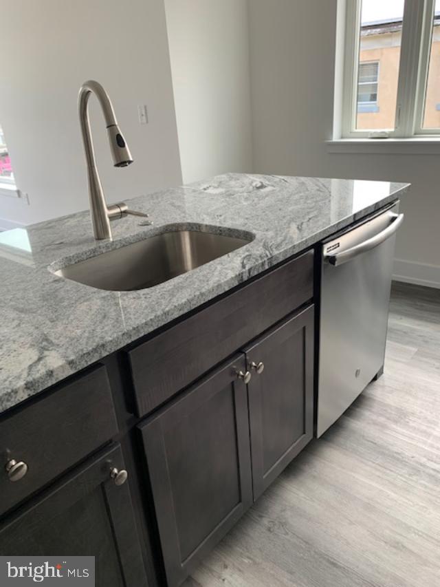 6162 Ridge Avenue, Unit 203 Philadelphia, PA 19128 - Photo 10 of 20 a close view of sink and mirror