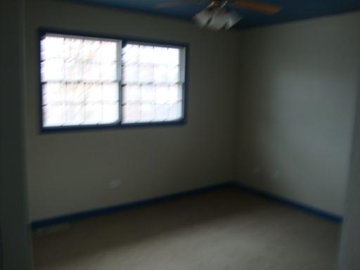 14443 Ridgeway Avenue Midlothian, IL 60445 - Photo 8 of 10 a view of a small space with a window