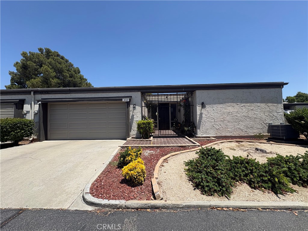26168 Birkdale Road Menifee, CA 92586 - Photo 1 of 15 front view of house with a yard