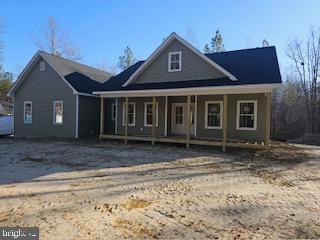 Charming new home with inviting porch.
