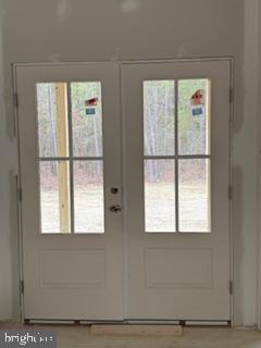 10417 Old Lawyers Road Unionville, VA 22567 - Photo 2 of 5 a view of an empty room with a window