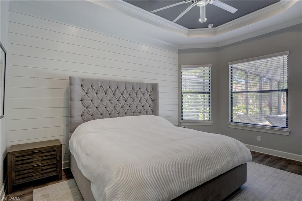 10261 Coconut Road Estero, FL 34135 - Photo 17 of 31 Large primary suite with tray ceiling.
