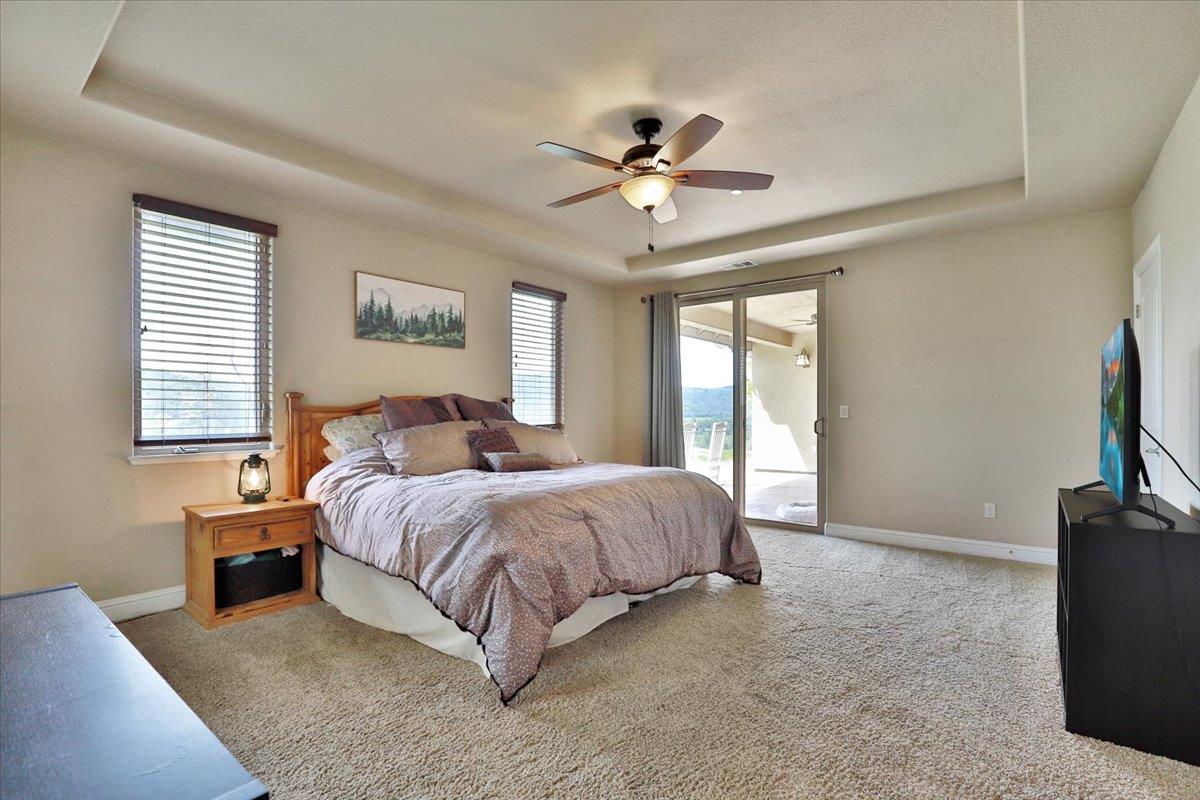 1111 Scott Road Lotus, CA 95651 - Photo 33 of 77 Master features coffered ceiling and outdoor access.