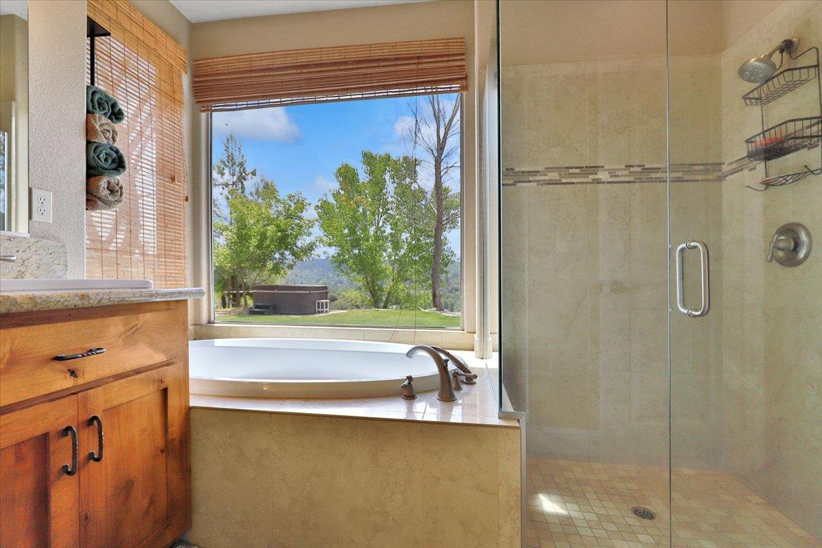 1111 Scott Road Lotus, CA 95651 - Photo 37 of 77 Relax in the large soaking tub overlooking the views.