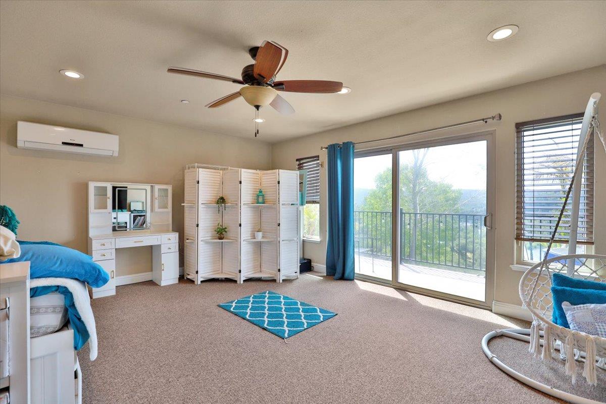 1111 Scott Road Lotus, CA 95651 - Photo 46 of 77 Upstairs room could be an office or recreation room or create your own space and enjoy the views from your private balcony.