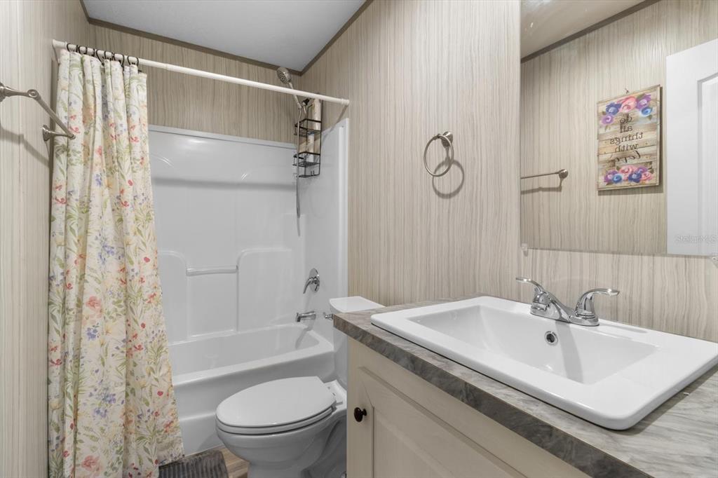 4686 C R 656 Webster, FL 33597 - Photo 17 of 32 a bathroom with a sink toilet and shower