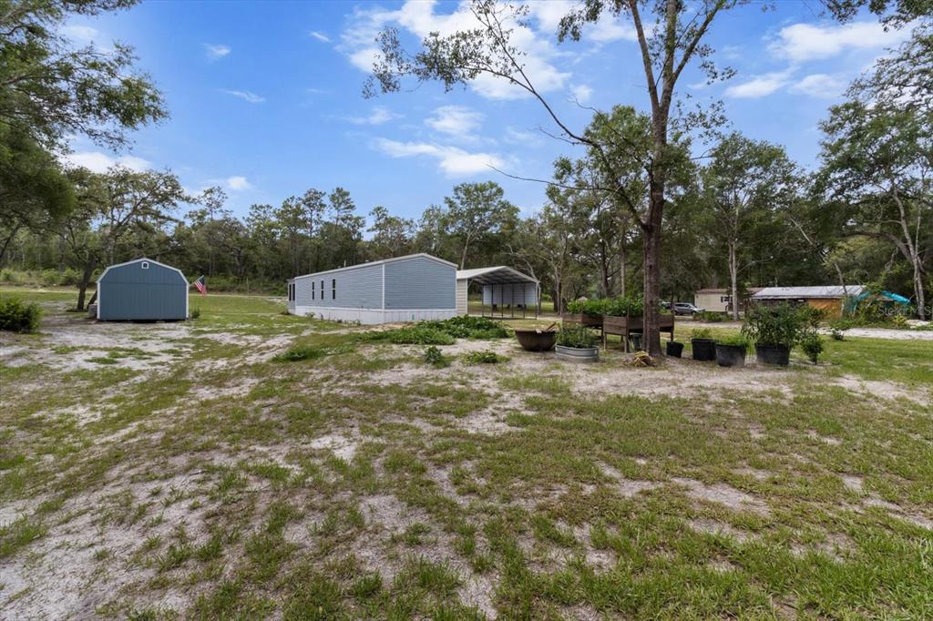 4686 C R 656 Webster, FL 33597 - Photo 27 of 32 a view of a lake with houses