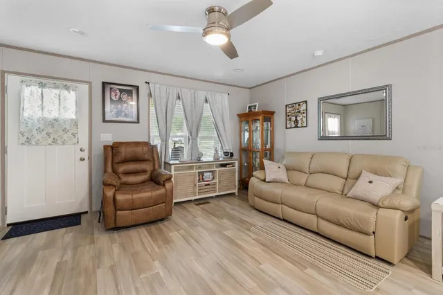 a living room with furniture and a window