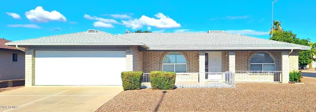 a front view of a house with a porch