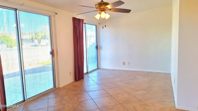 a view of an empty room and window