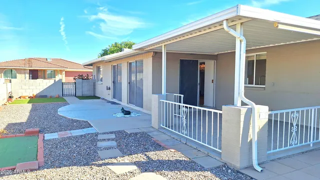a front view of a house with yard