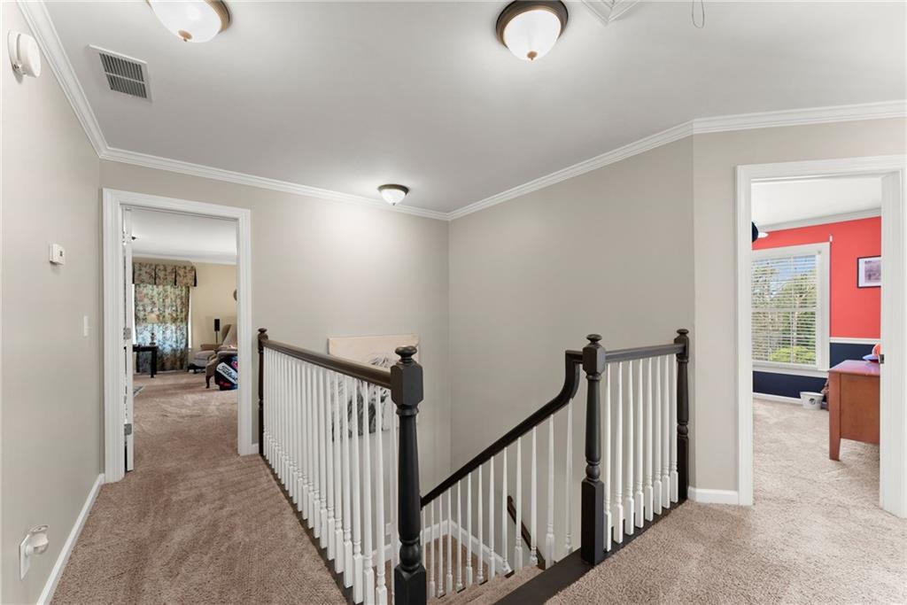 4834 Upper Berkshire Road Flowery Branch, GA 30542 - Photo 26 of 76 a view of a livingroom with a balcony