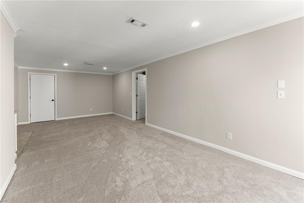 4834 Upper Berkshire Road Flowery Branch, GA 30542 - Photo 44 of 76 a view of an empty room