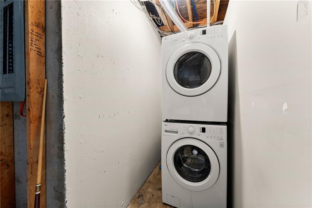 4834 Upper Berkshire Road Flowery Branch, GA 30542 - Photo 51 of 76 a utility room with dryer and washer