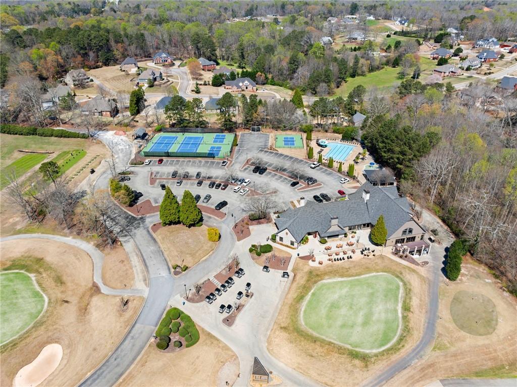 4834 Upper Berkshire Road Flowery Branch, GA 30542 - Photo 70 of 76 an aerial view of a swimming pool with outdoor seating