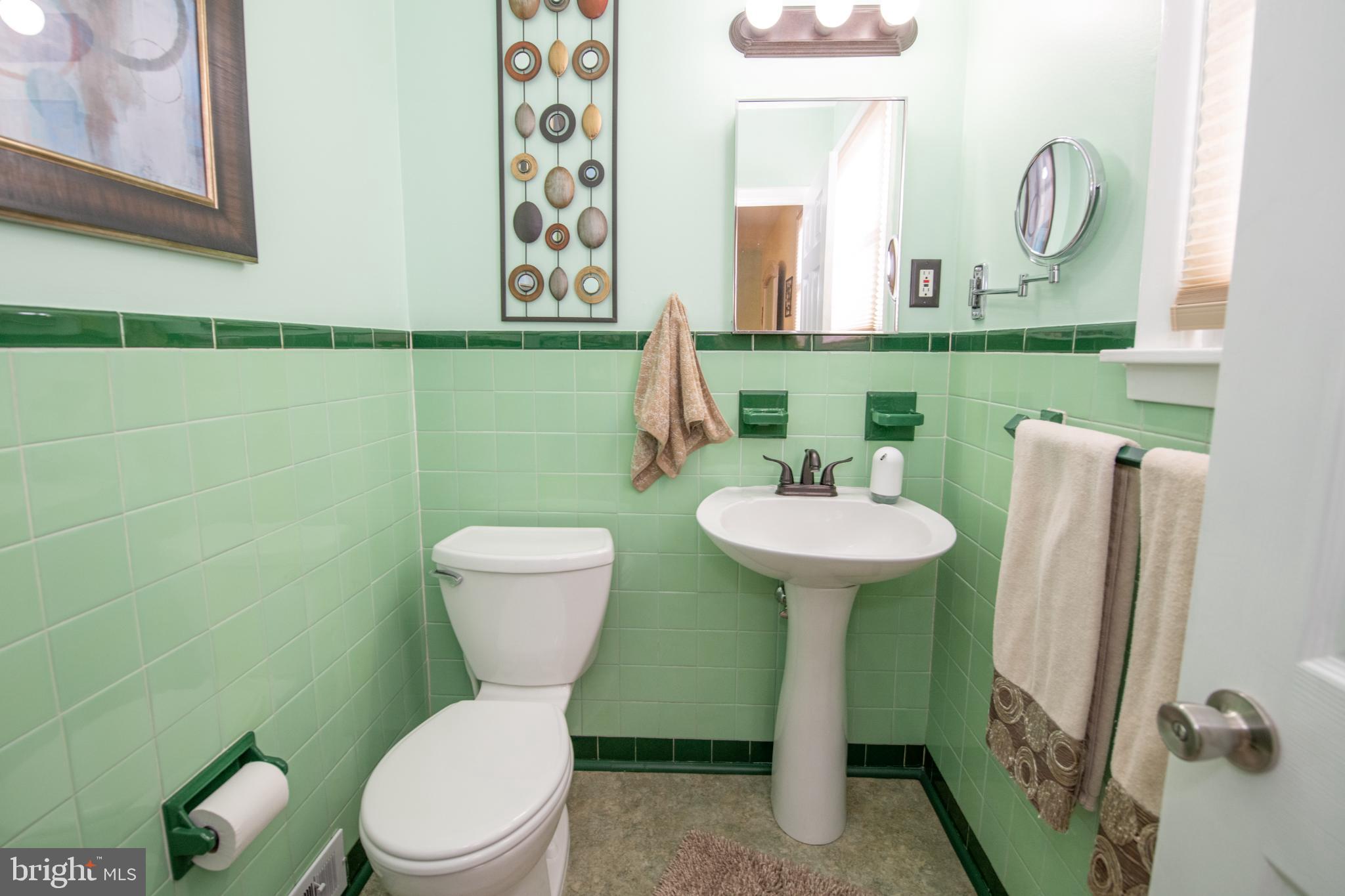 376 Newtown Road Warminster, PA 18974 - Photo 14 of 26 Charming mint green bathroom retreat.