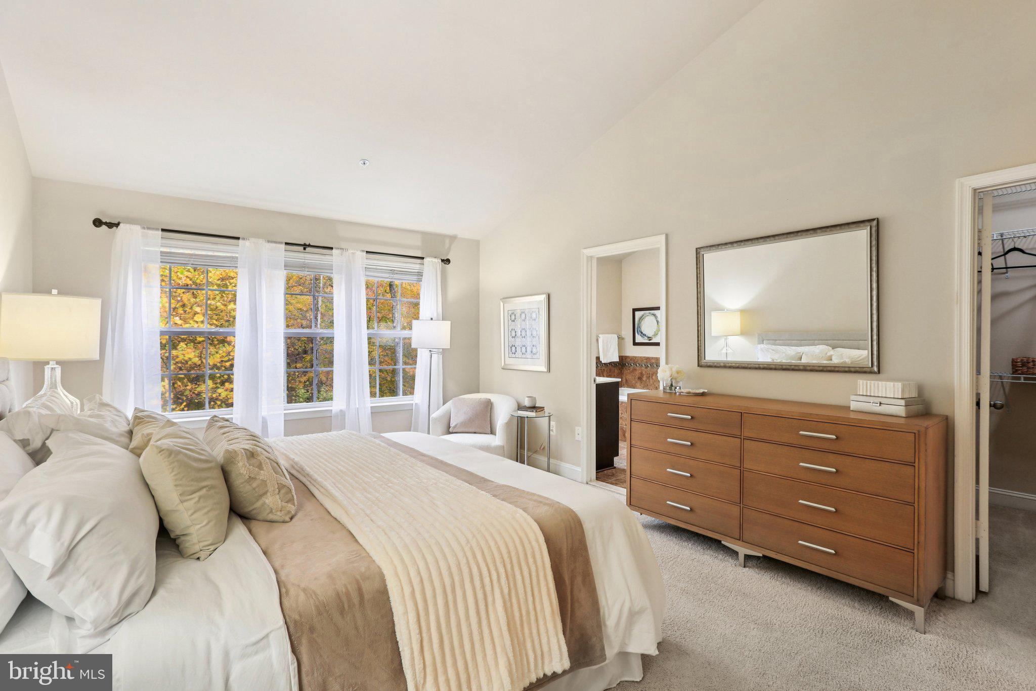 9384 Rock Ripple Lane Laurel, MD 20723 - Photo 18 of 42 a bedroom with a bed and wooden floor