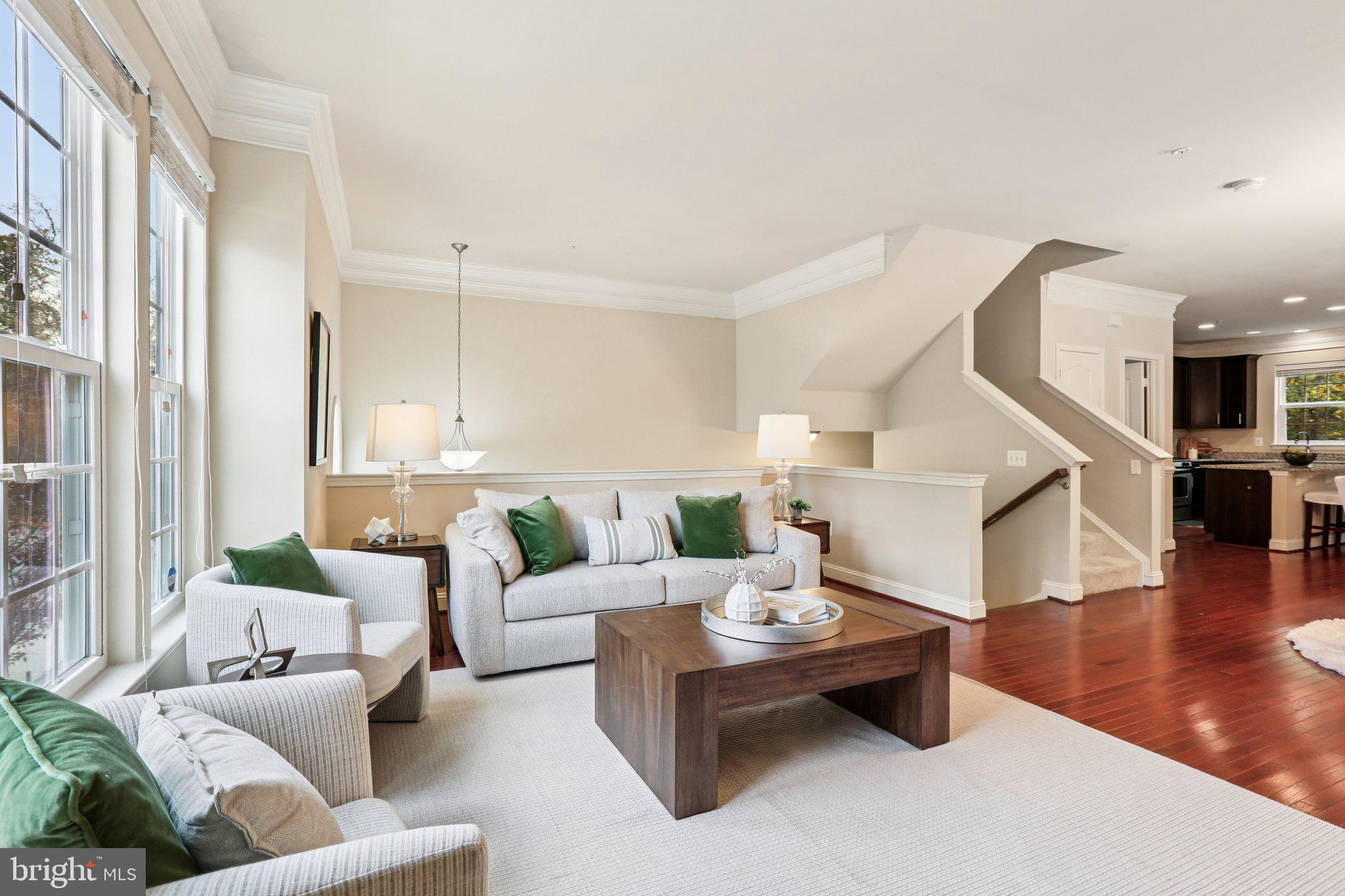 9384 Rock Ripple Lane Laurel, MD 20723 - Photo 2 of 42 a living room with furniture and wooden floor