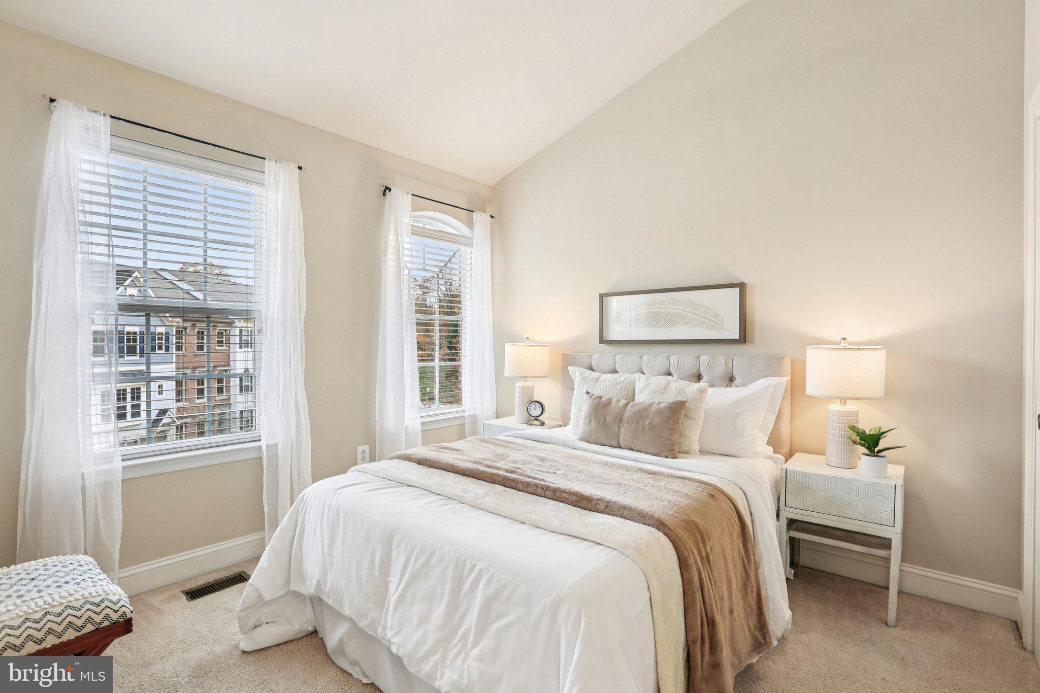 9384 Rock Ripple Lane Laurel, MD 20723 - Photo 25 of 42 a bedroom with a bed and a window