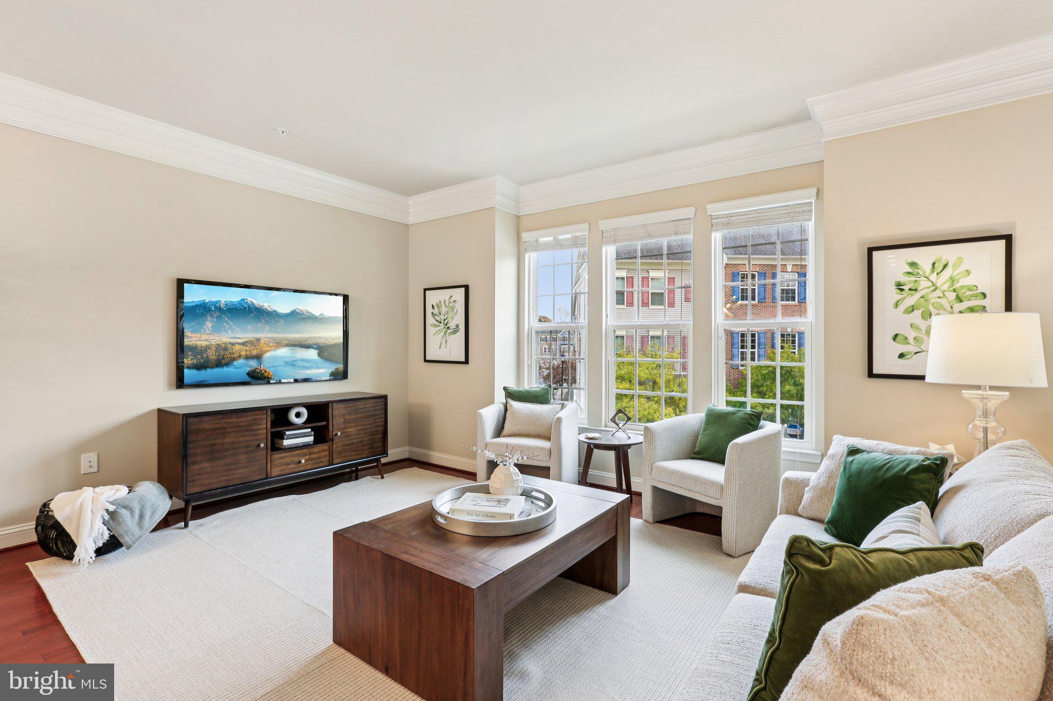 9384 Rock Ripple Lane Laurel, MD 20723 - Photo 3 of 42 a living room with furniture and a flat screen tv