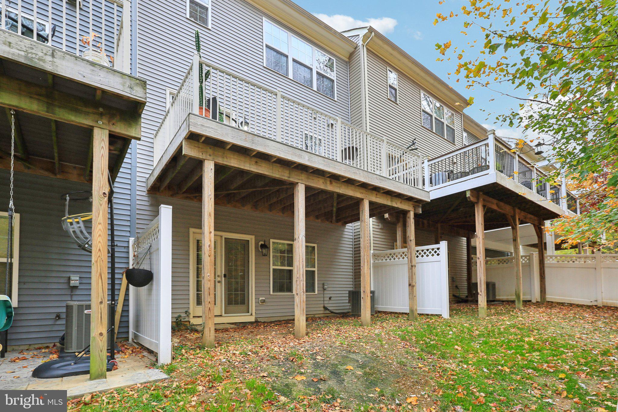 9384 Rock Ripple Lane Laurel, MD 20723 - Photo 37 of 42 a view of a house with a yard