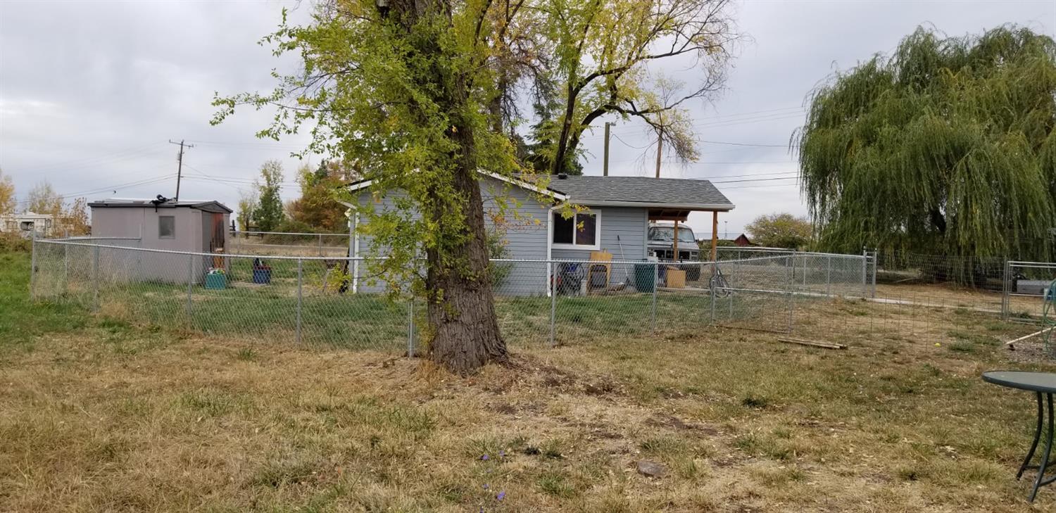 2492 Stevens Road Eagle Point, OR 97524 - Photo 15 of 15 a view of a house with a yard