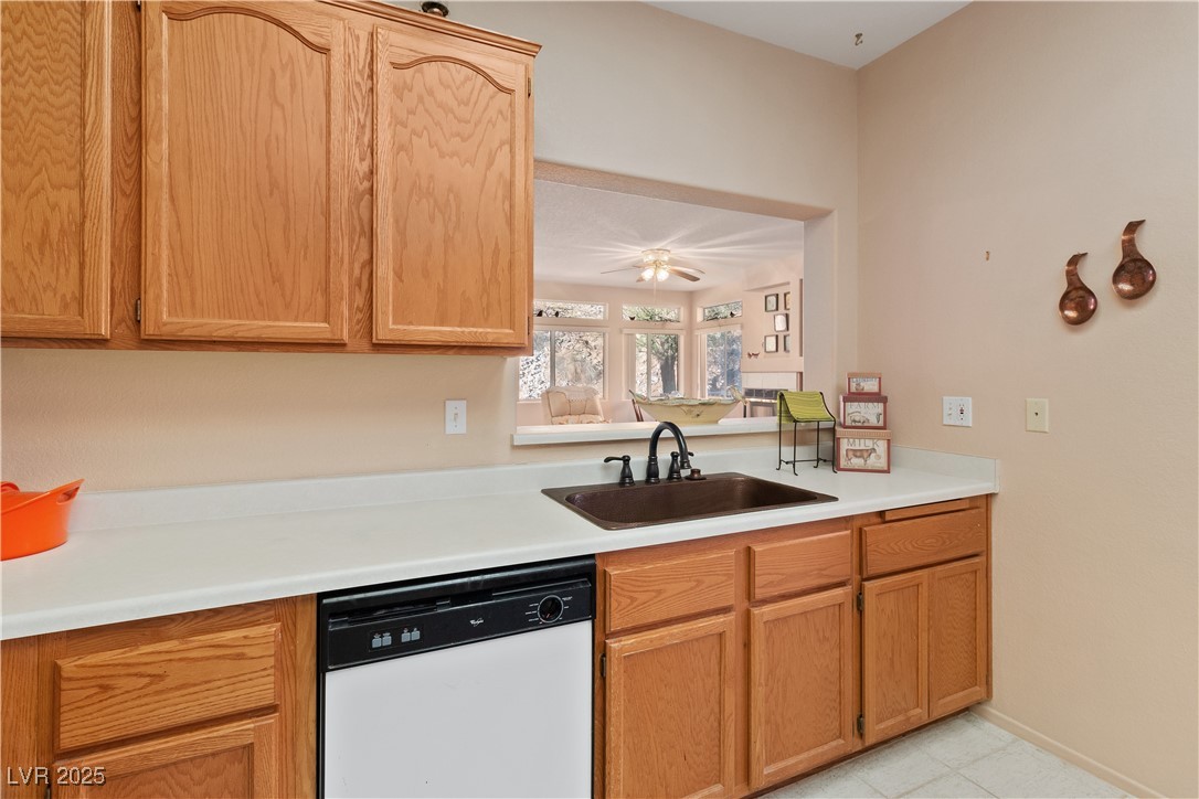 3342 Pheasant Canyon Way, Unit 1013 Laughlin, NV 89029 - Photo 20 of 74 Kitchen with white dishwasher, light countertops,