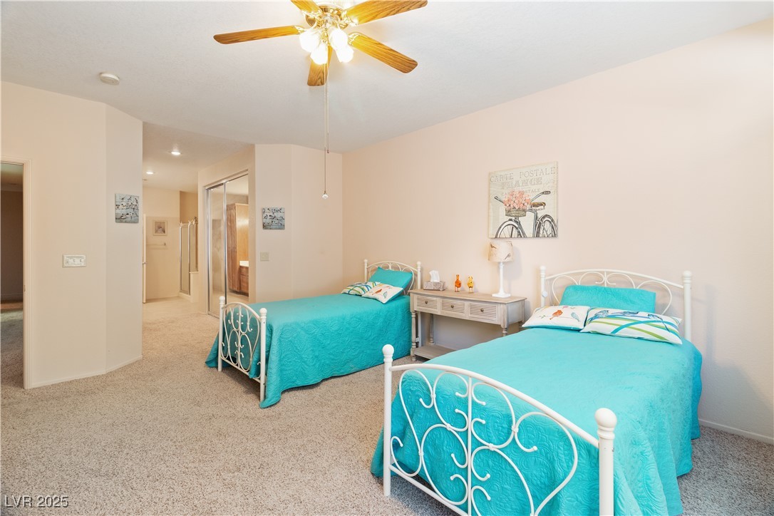 3342 Pheasant Canyon Way, Unit 1013 Laughlin, NV 89029 - Photo 23 of 74 Primary Bedroom featuring a closet, carpet, a ceil