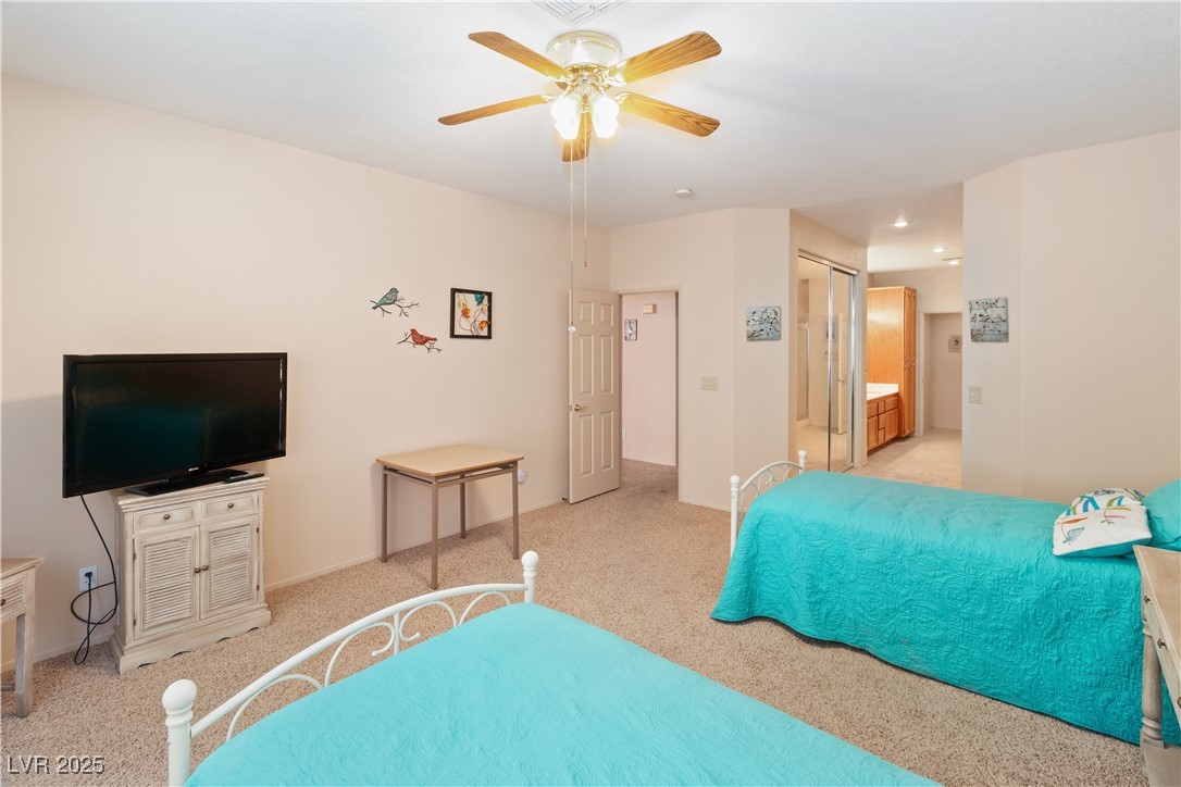 3342 Pheasant Canyon Way, Unit 1013 Laughlin, NV 89029 - Photo 24 of 74 Primary Bedroom with a ceiling fan, light colored