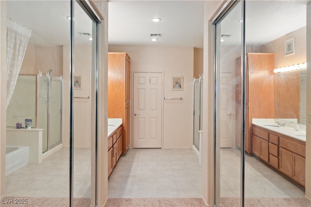 3342 Pheasant Canyon Way, Unit 1013 Laughlin, NV 89029 - Photo 26 of 74 Primary Bathroom featuring tile flooring, dual sin