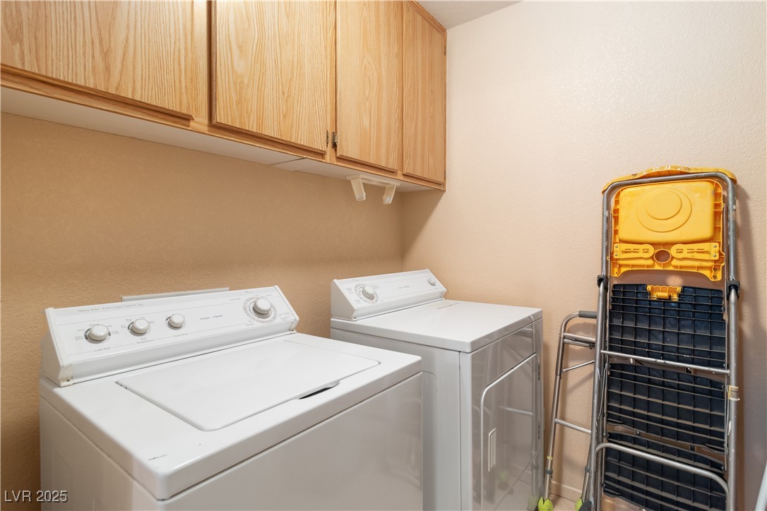 3342 Pheasant Canyon Way, Unit 1013 Laughlin, NV 89029 - Photo 40 of 74 Clothes washing area with cabinet space and indepe