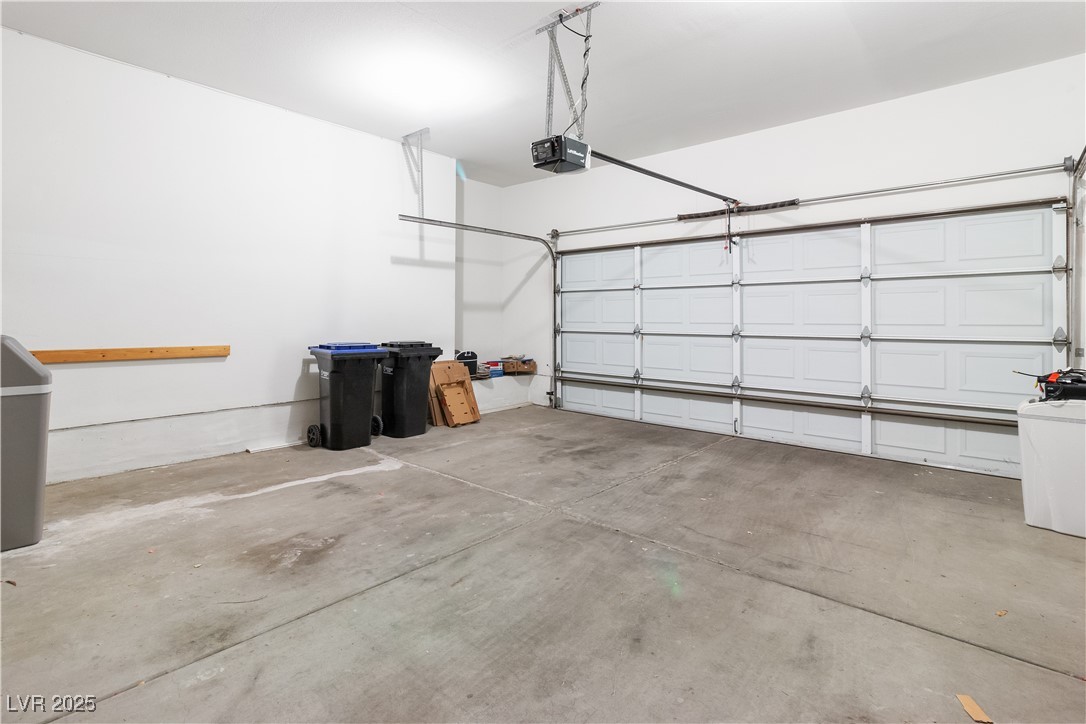 3342 Pheasant Canyon Way, Unit 1013 Laughlin, NV 89029 - Photo 42 of 74 2 car Garage featuring a garage door opener