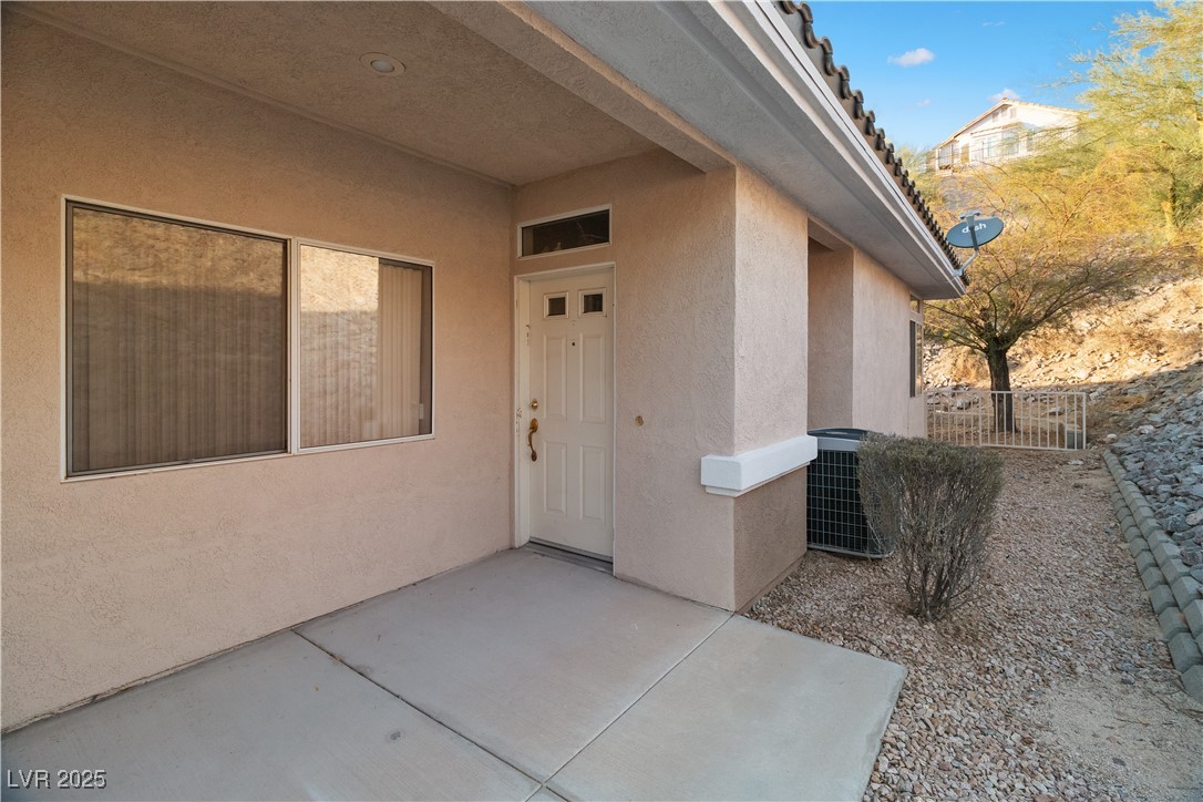 3342 Pheasant Canyon Way, Unit 1013 Laughlin, NV 89029 - Photo 5 of 74 Doorway to property featuring central air conditio