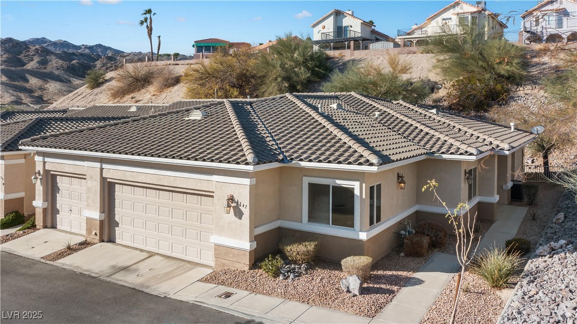 3342 Pheasant Canyon Way, Unit 1013 Laughlin, NV 89029 - Photo 55 of 74 View of front of property featuring stucco siding,